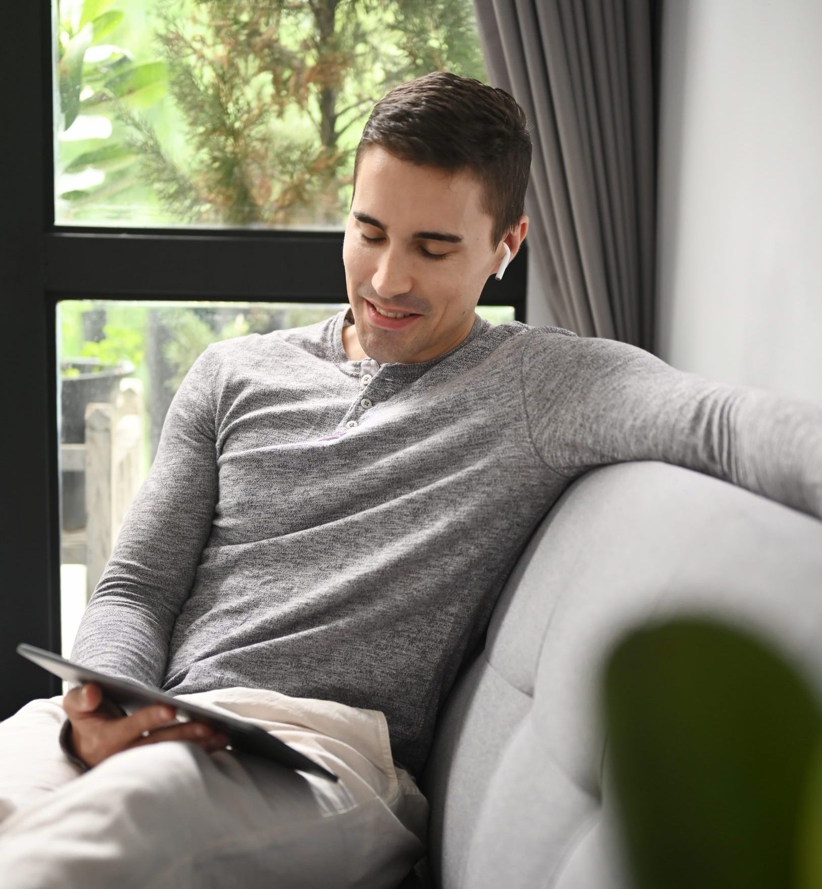 Man using a digital tablet.